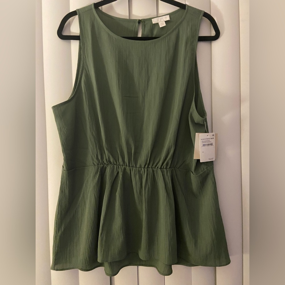 Olive green peplum tank top.